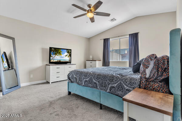 138 North Signal Butte Road Apache Junction, AZ 85120 - Photo 15 of 25 a bedroom with a bed and a flat screen tv