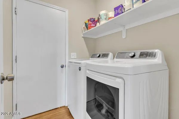 a utility room with dryer and washer