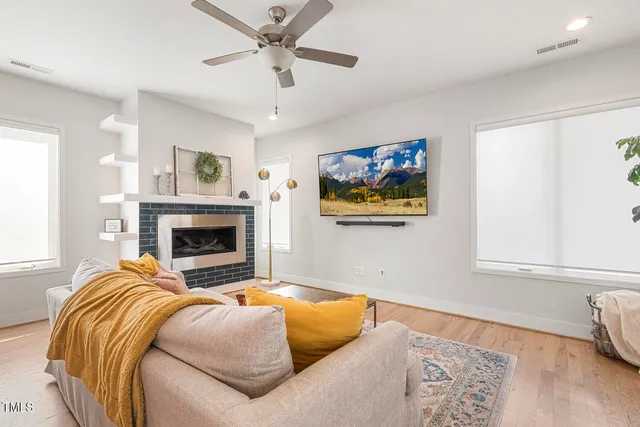 a bedroom with a bed and a fireplace