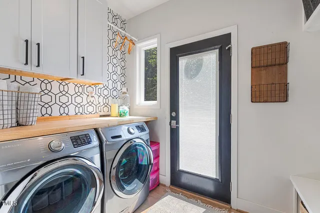 a utility room with dryer and washer