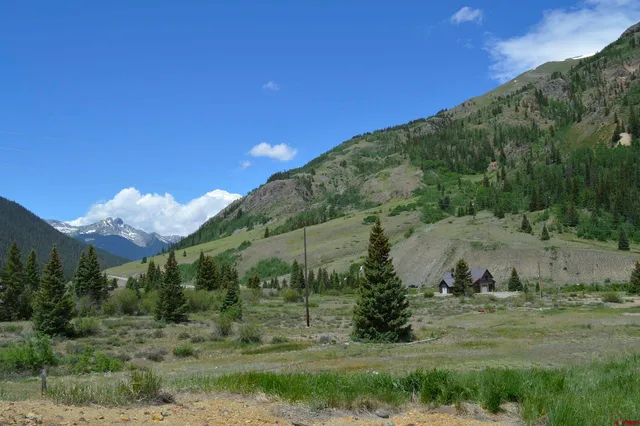 a view of a big yard with green space