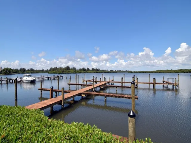 a view of a chairs and table in the garden