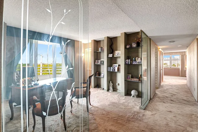 a view of a kitchen and dining room