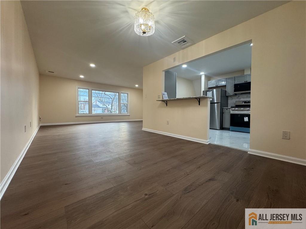 1868 Oak Tree Road Edison, NJ 08820 - Photo 11 of 24 a view of an empty room with a window