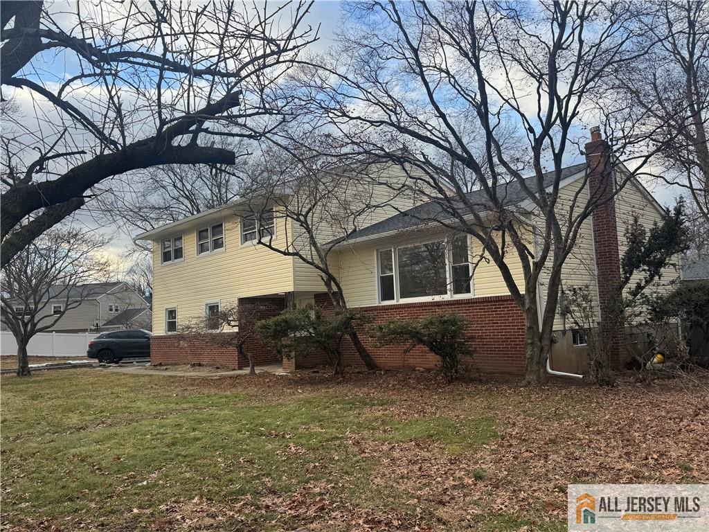 1868 Oak Tree Road Edison, NJ 08820 - Photo 2 of 24 a view of a house with a yard