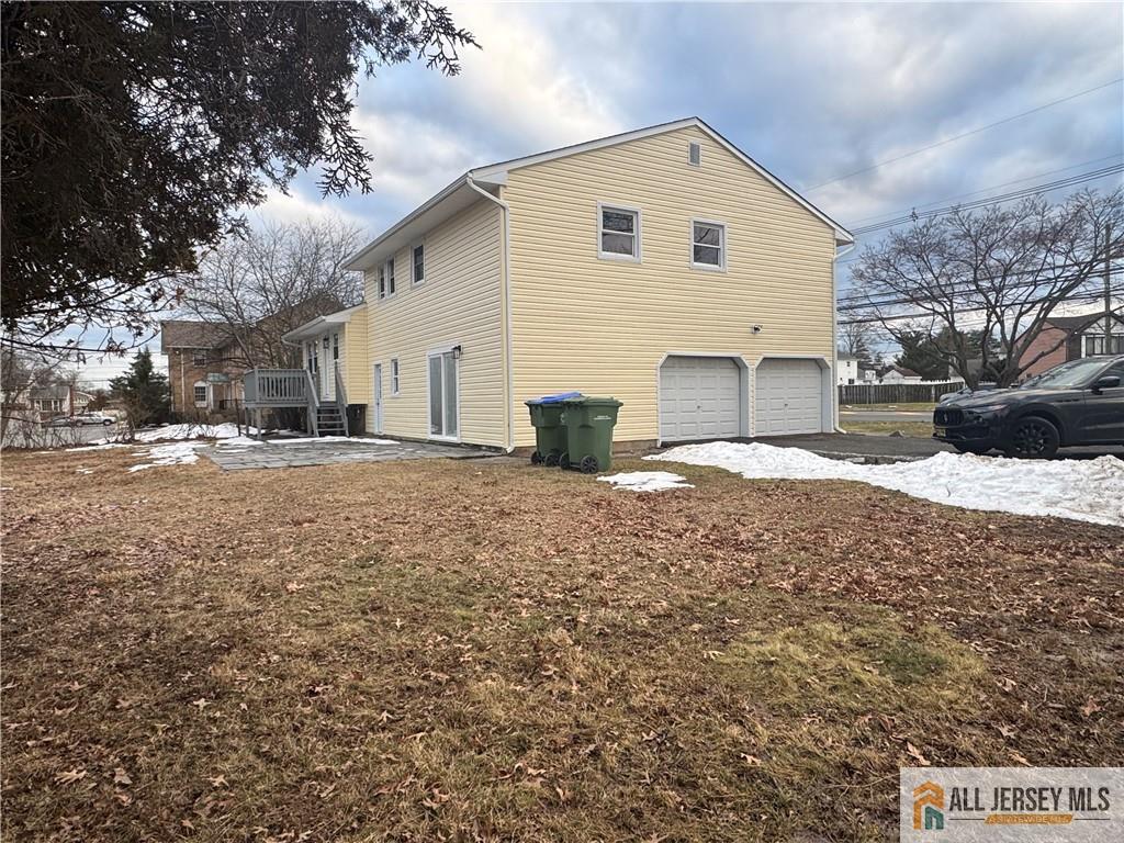 1868 Oak Tree Road Edison, NJ 08820 - Photo 23 of 24 a view of a house with a yard