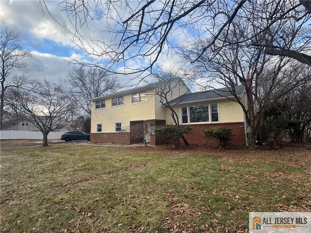1868 Oak Tree Road Edison, NJ 08820 - Photo 3 of 24 a view of a house with a yard