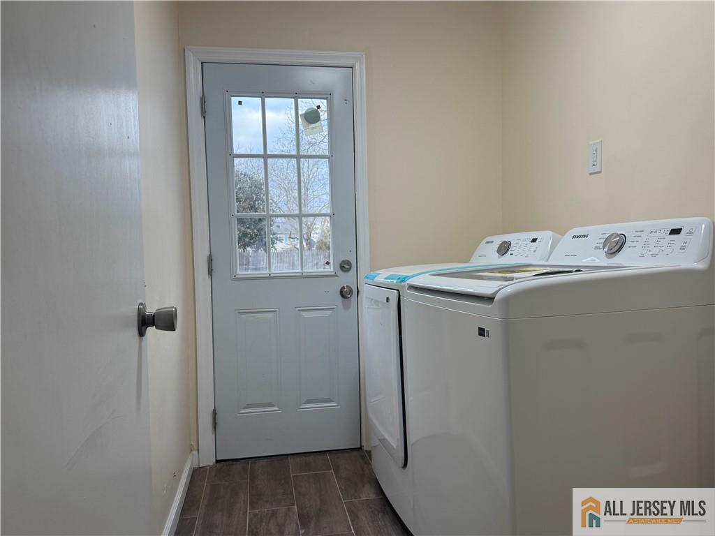 1868 Oak Tree Road Edison, NJ 08820 - Photo 7 of 24 a view of utility room with washer and dryer