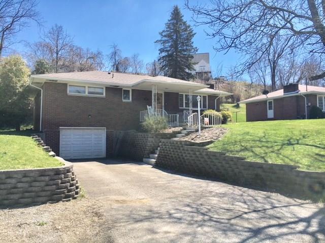1622 Rostraver Road Belle Vernon, PA 15012 - Photo 24 of 24 A long view from the road with extra off-street parking.