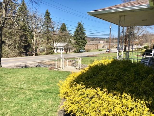 1622 Rostraver Road Belle Vernon, PA 15012 - Photo 4 of 24 Covered front porch for relaxing outdoors.