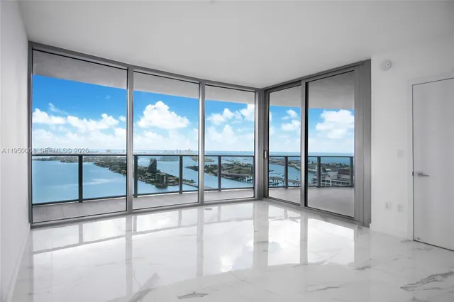 a bathroom with a shower a toilet and a shower