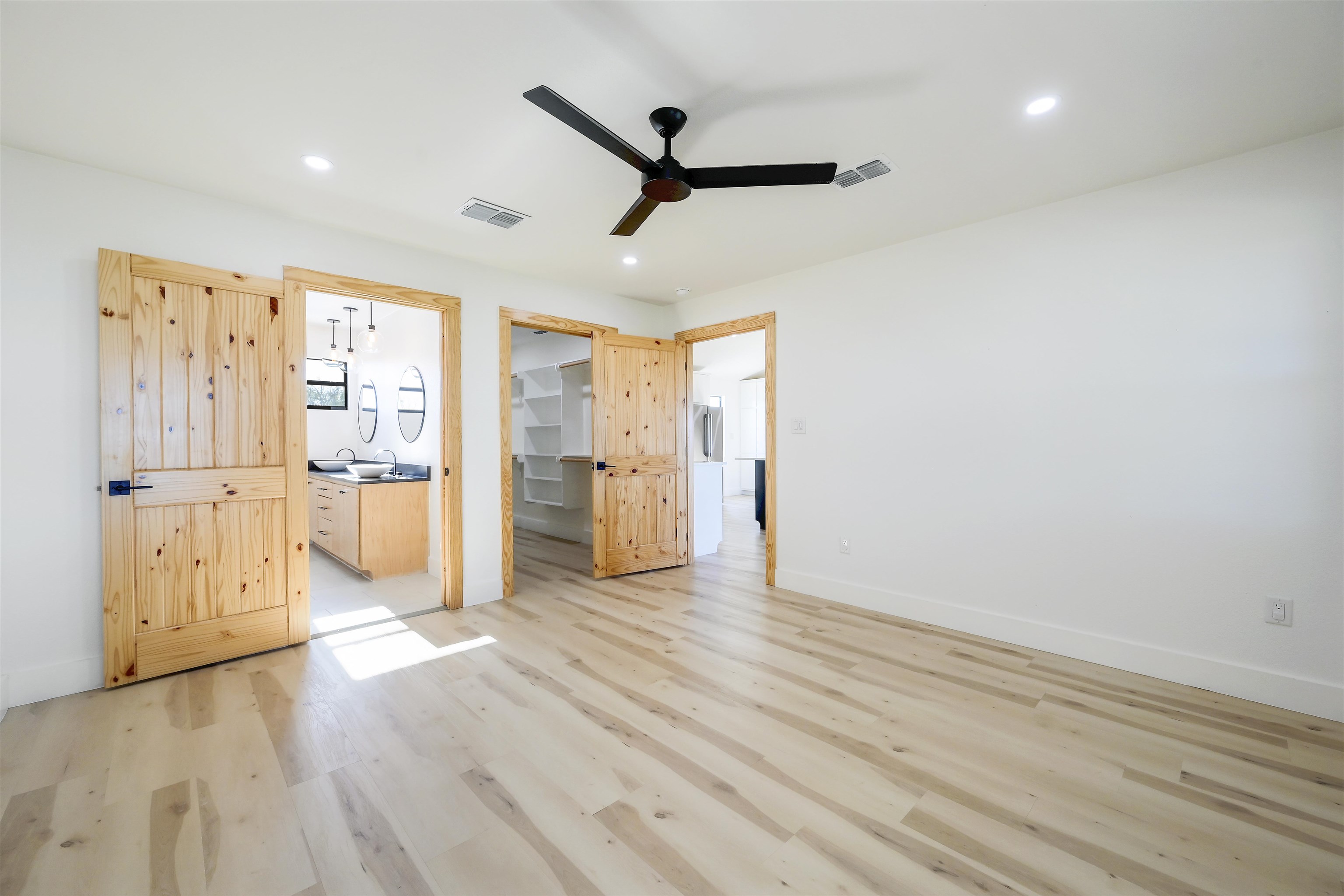4100 Rm 690 Burnet, TX 78611 - Photo 13 of 30 a view of a big room with wooden floor and windows