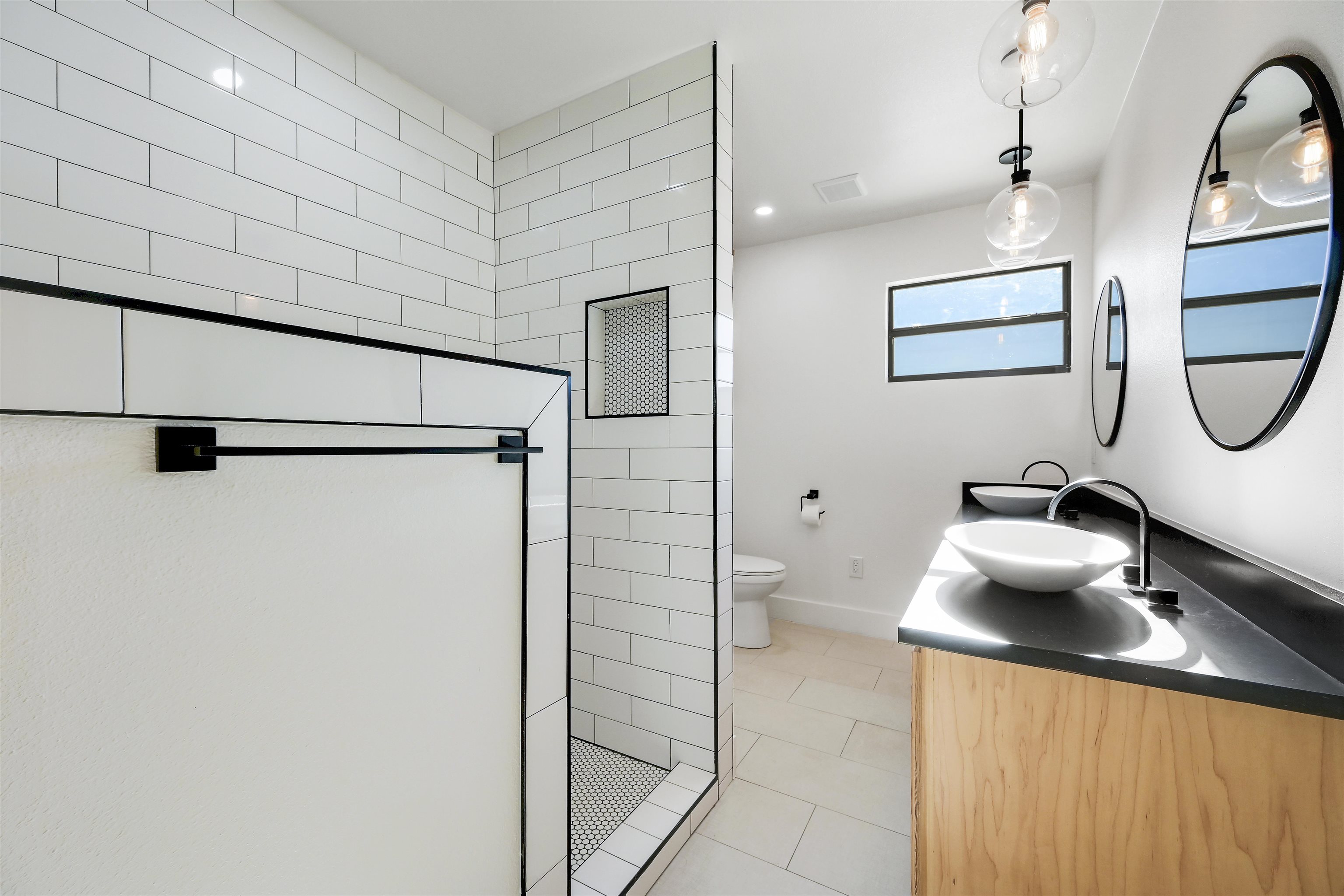 4100 Rm 690 Burnet, TX 78611 - Photo 14 of 30 a bathroom with a sink and a mirror