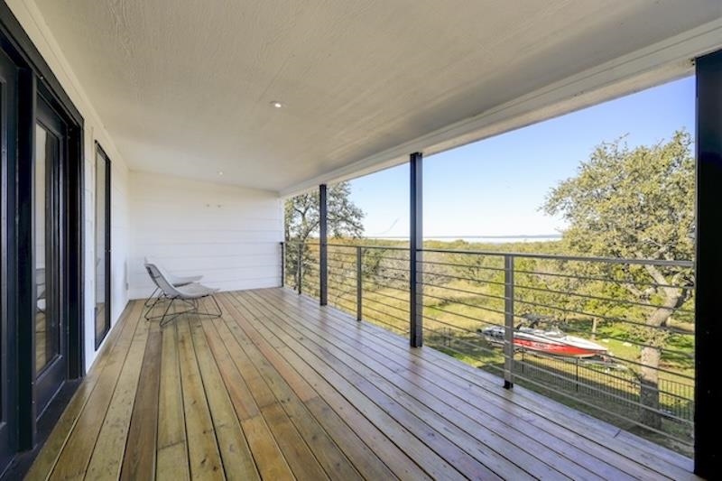 4100 Rm 690 Burnet, TX 78611 - Photo 19 of 30 a view of balcony with wooden floor
