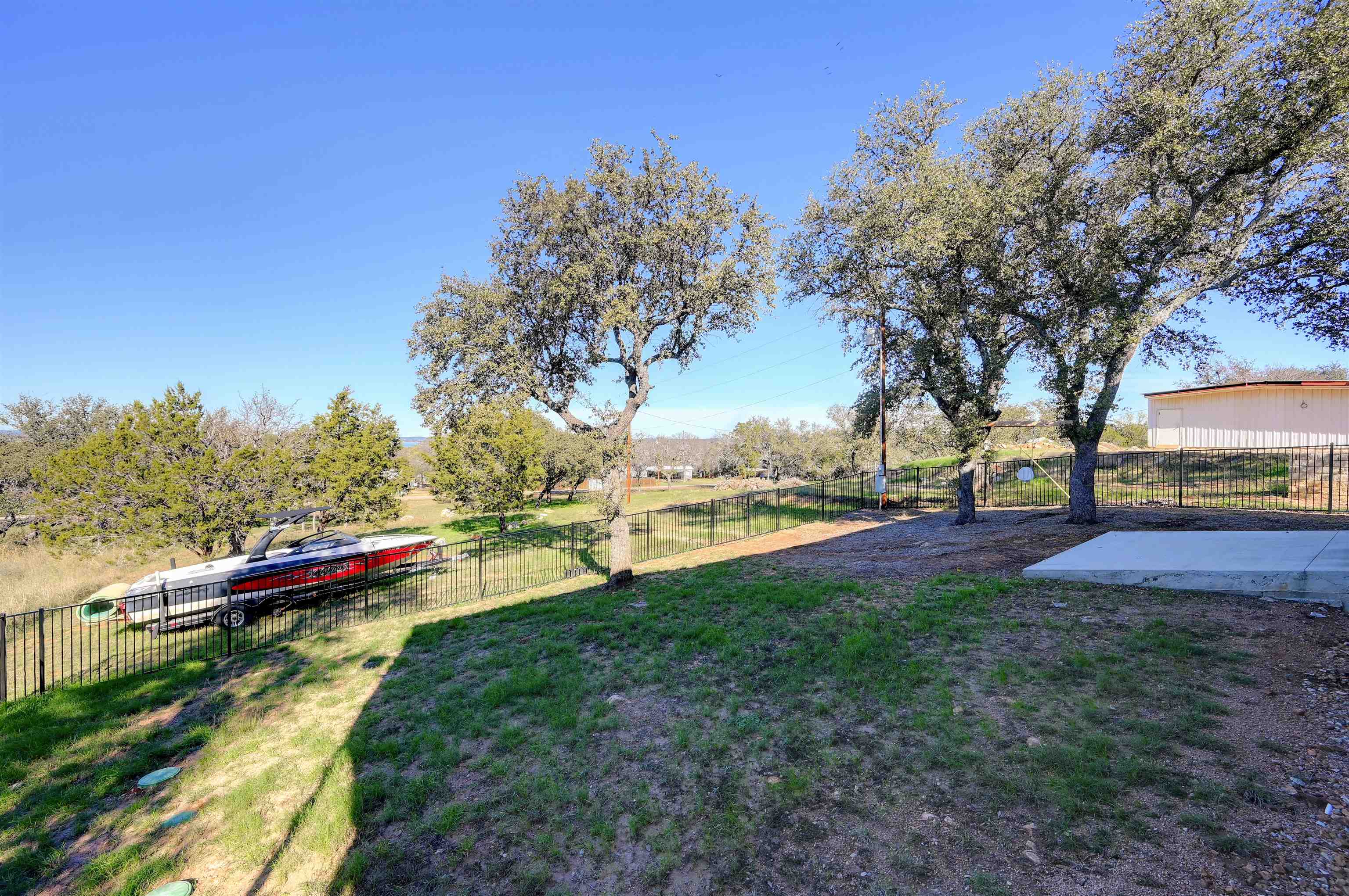 4100 Rm 690 Burnet, TX 78611 - Photo 27 of 30 a view of yard with large trees and playing ground