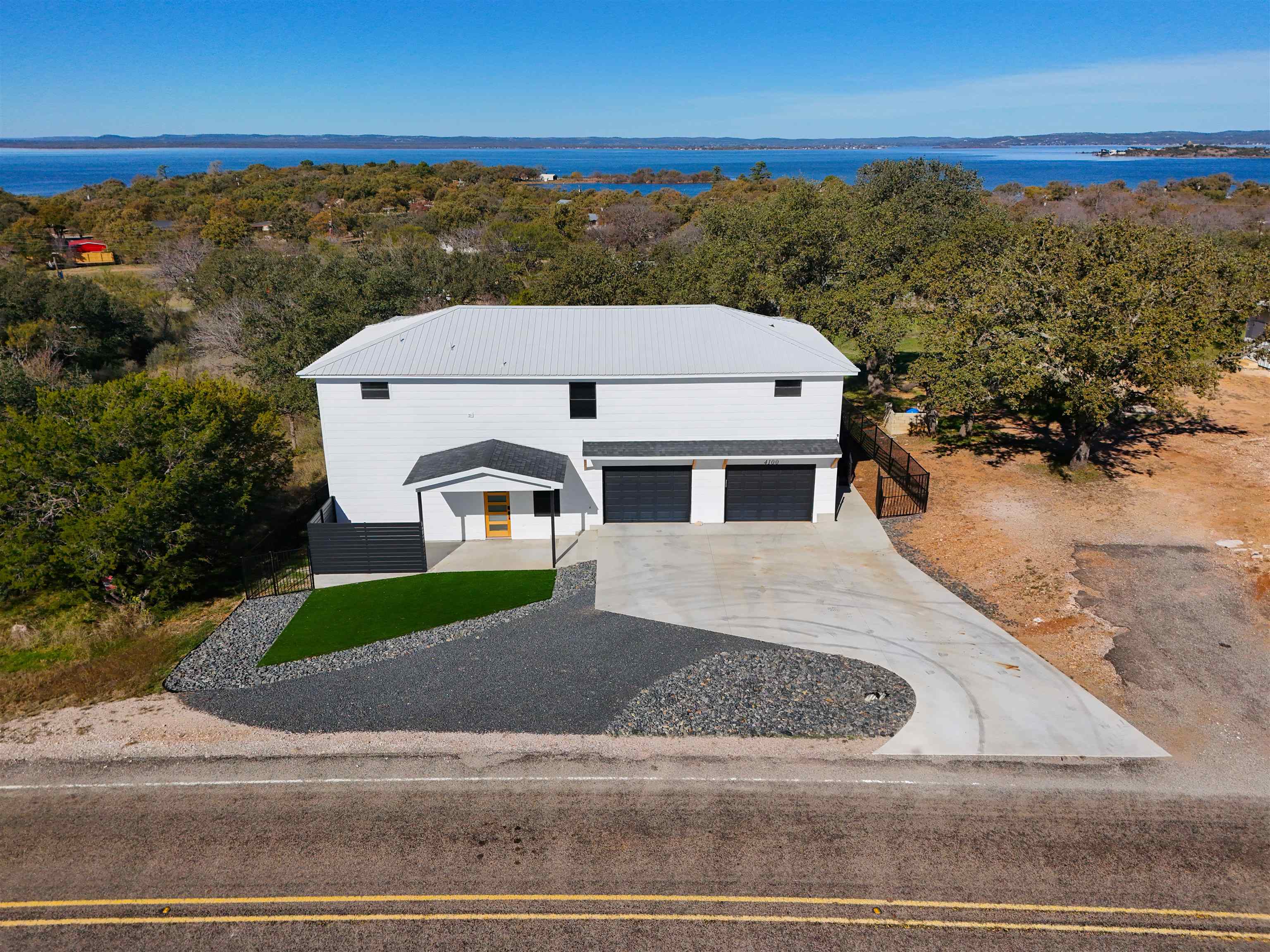 4100 Rm 690 Burnet, TX 78611 - Photo 4 of 30 a aerial view of a house next to a yard