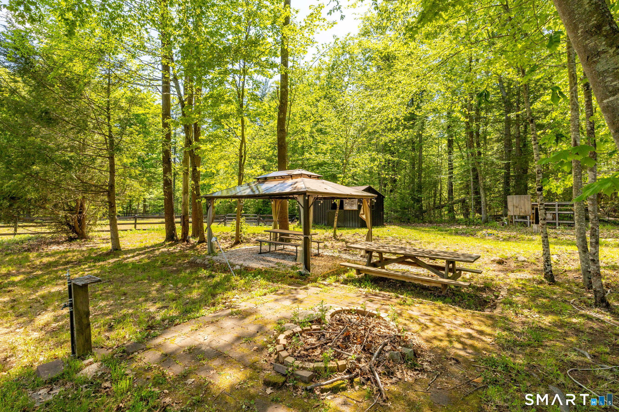250 Center Hill Road Barkhamsted, CT 06063 - Photo 32 of 40 a swimming pool with a backyard