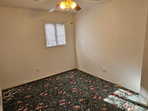 an empty room with a window