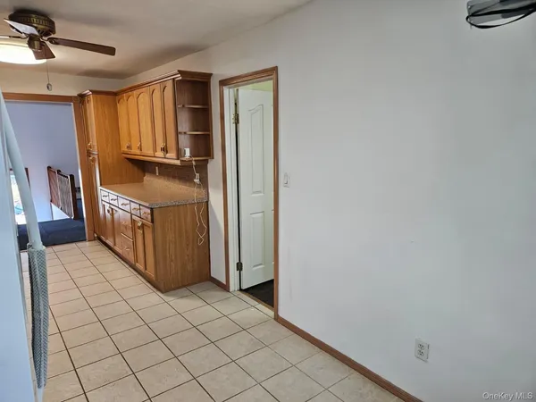 a view of a hallway with entryway
