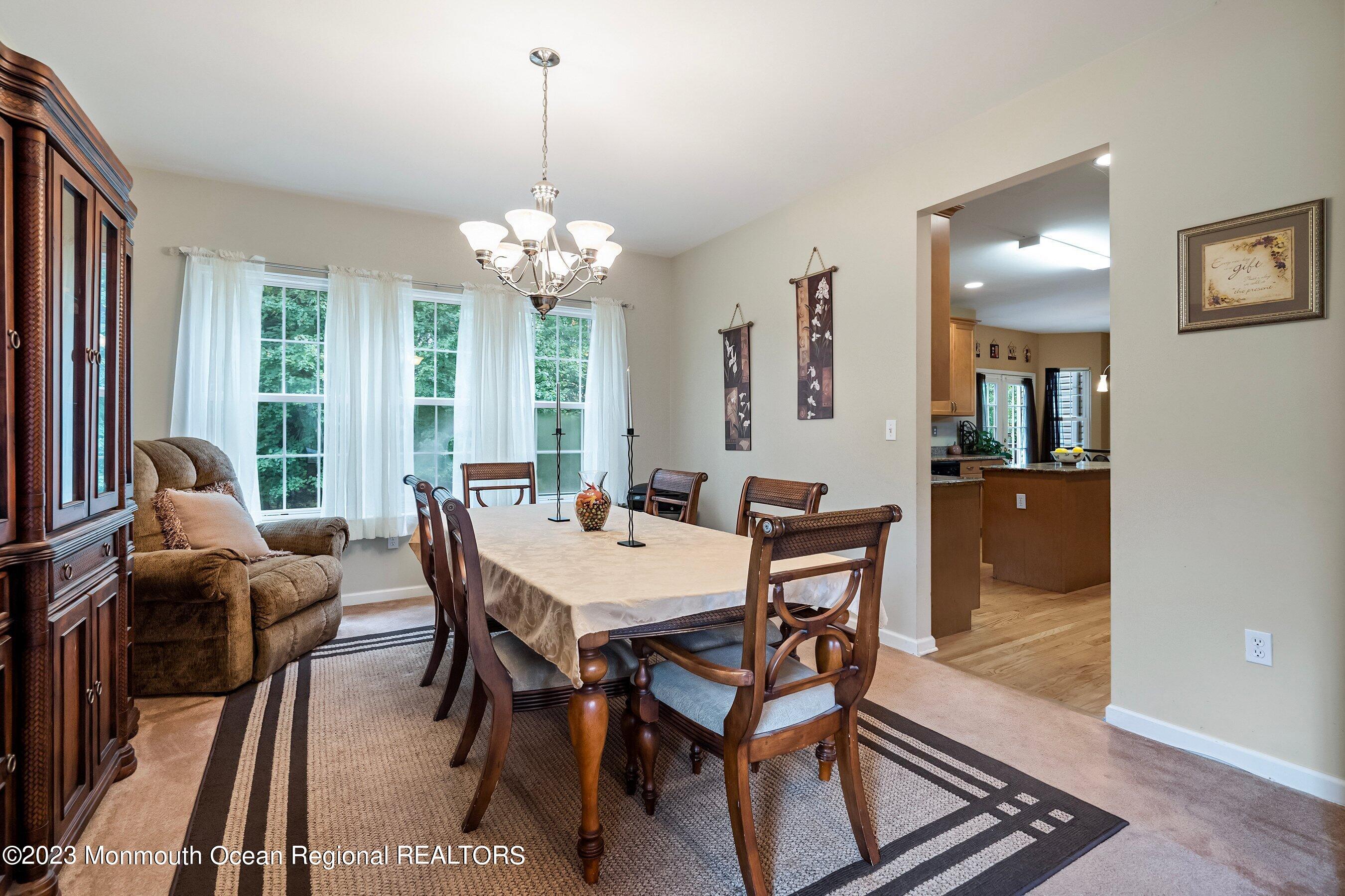30 Cedar Knoll Road Jackson, NJ 08527 - Photo 11 of 24 a view of a dining room with furniture window and outside view