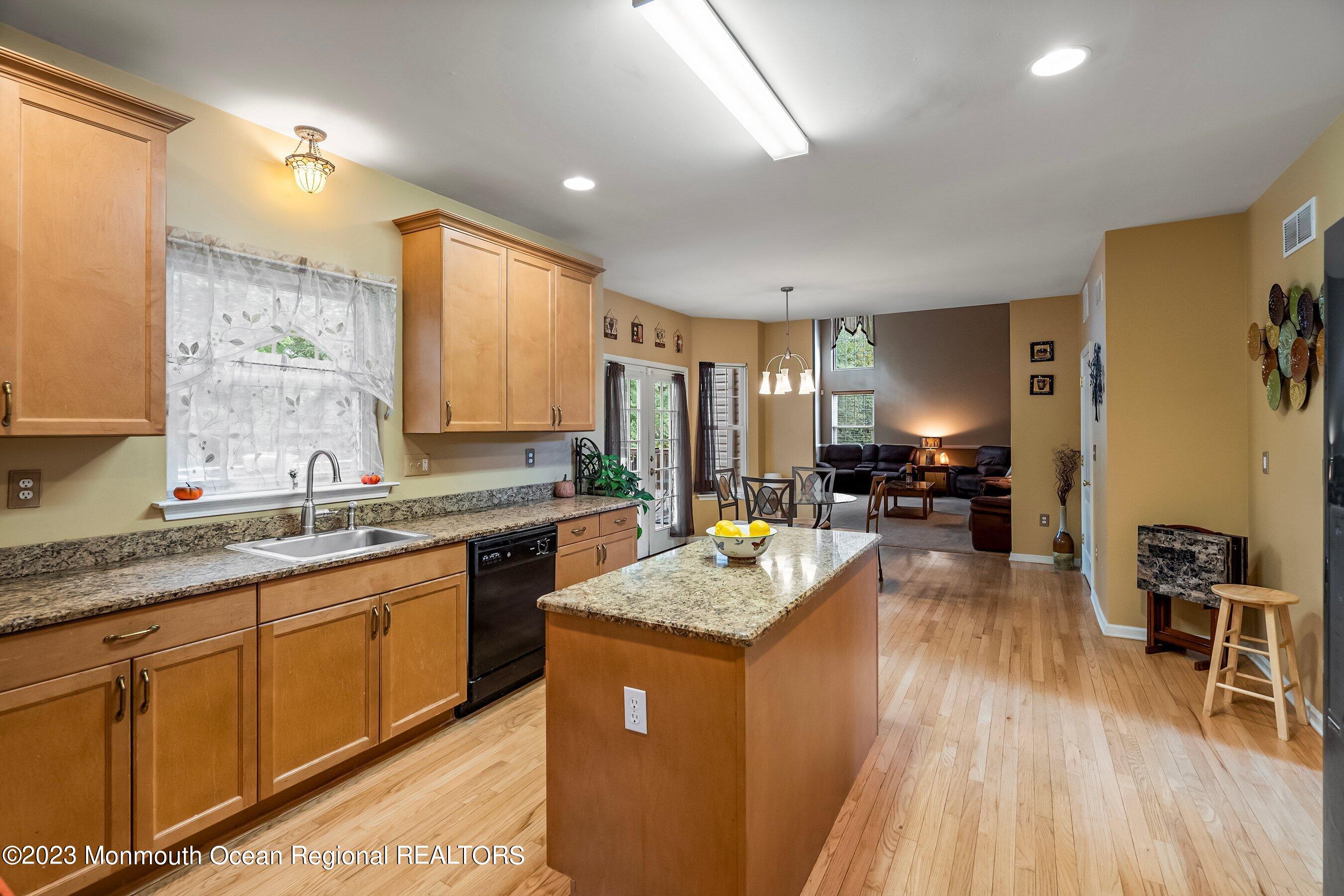 30 Cedar Knoll Road Jackson, NJ 08527 - Photo 14 of 24 a large kitchen with sink stove and cabinets