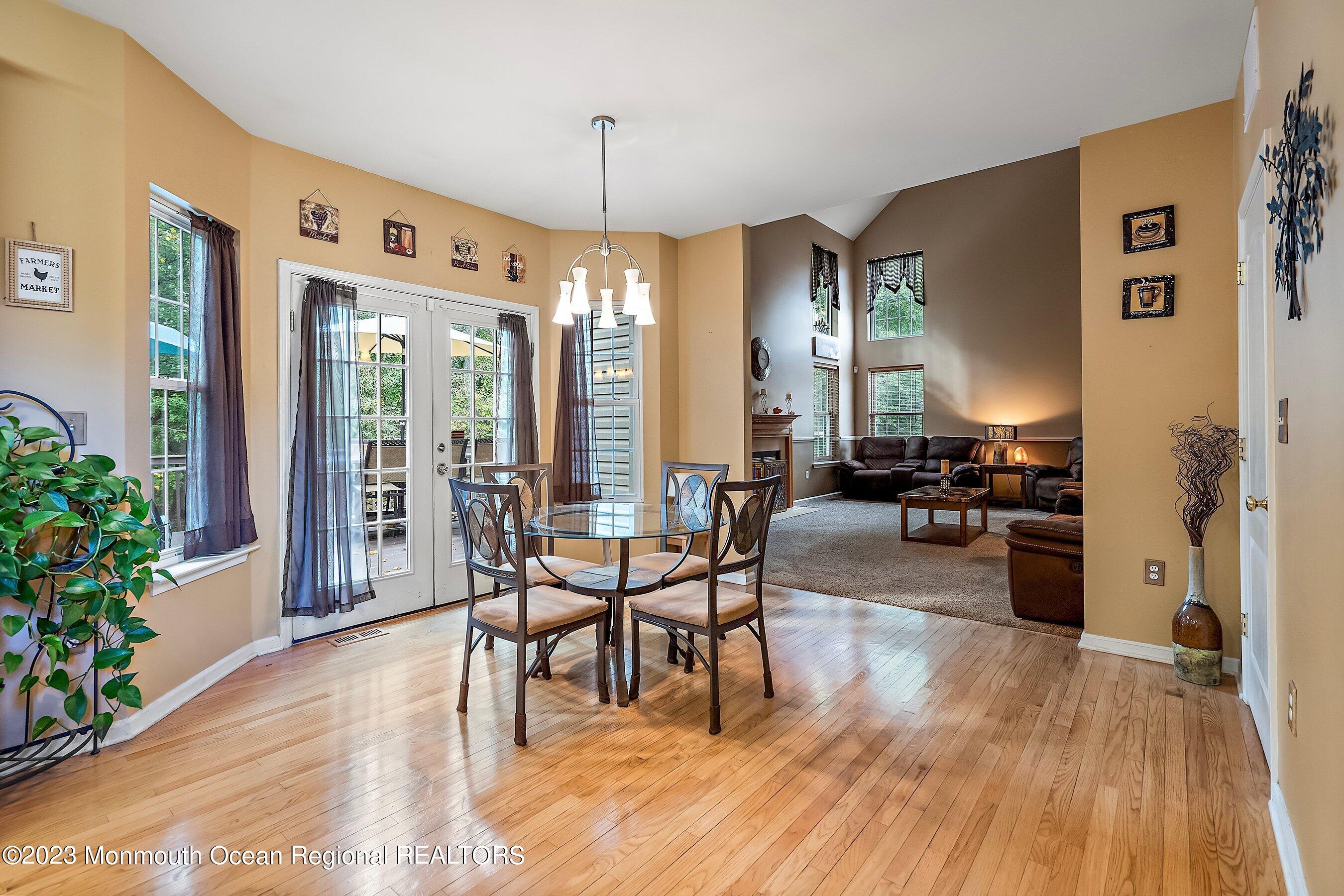 30 Cedar Knoll Road Jackson, NJ 08527 - Photo 16 of 24 a view of a dining room with furniture window and wooden floor