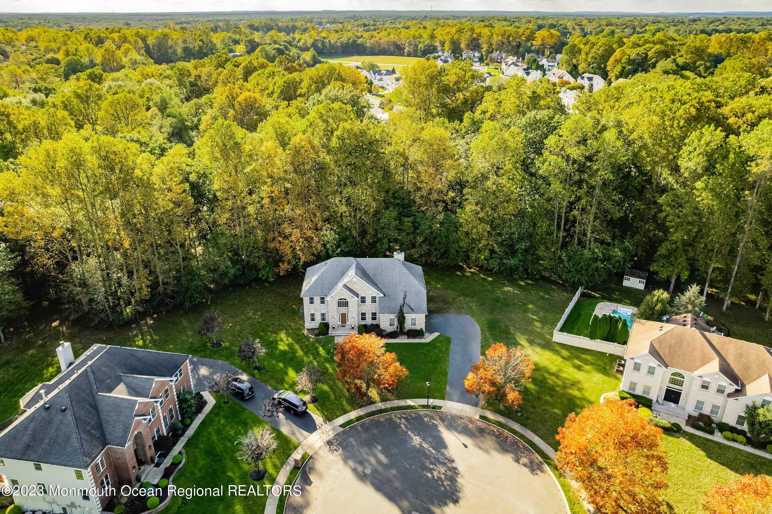 30 Cedar Knoll Road Jackson, NJ 08527 - Photo 3 of 24 an aerial view of a house with swimming pool and garden view