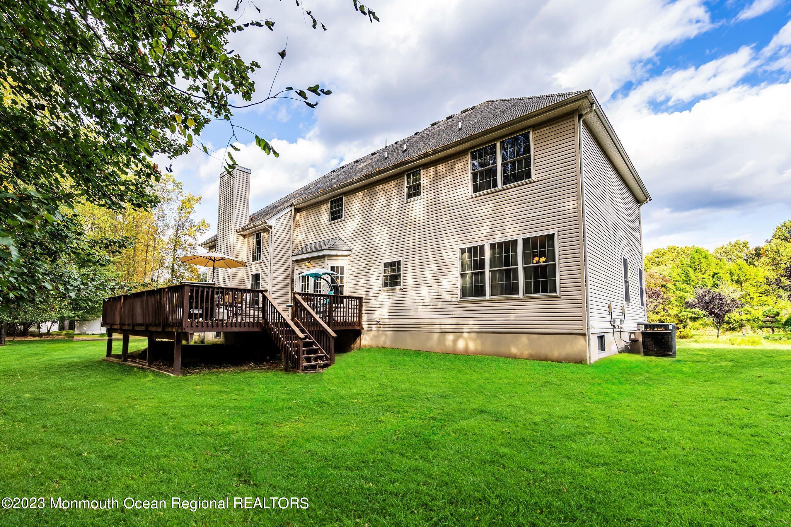 30 Cedar Knoll Road Jackson, NJ 08527 - Photo 5 of 24 a view of a house with a yard and sitting area