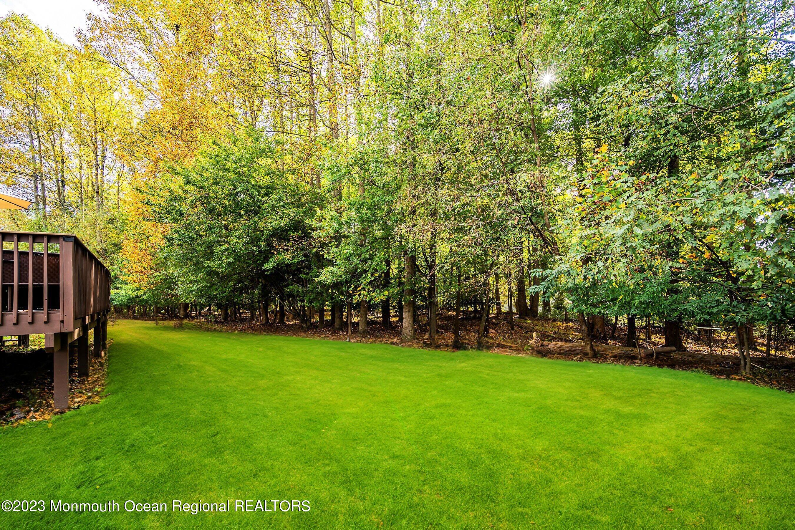30 Cedar Knoll Road Jackson, NJ 08527 - Photo 7 of 24 a view of a trees in front of a house