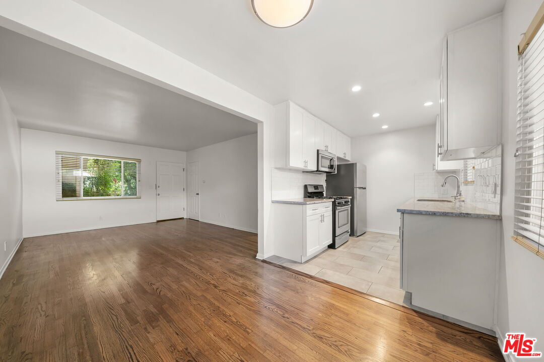 1517 Harvard Street, Unit 3 Santa Monica, CA 90404 - Photo 10 of 20 a view of kitchen with wooden floor