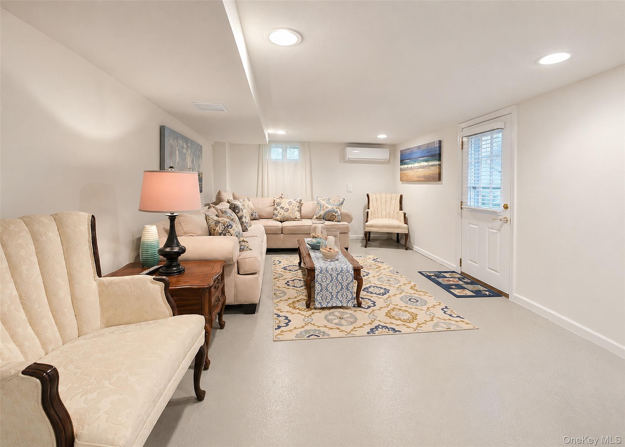 17 Beech Road Rocky Point, NY 11778 - Photo 14 of 26 Lower Level - Large Den With Outside Separate Entrance & Hi-Hats.
