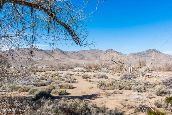 a view of a backyard of the house