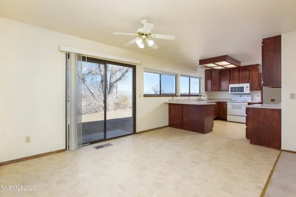 a kitchen with a cabinets and window