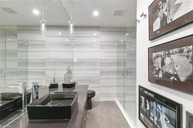 a bathroom with a sink and a shower