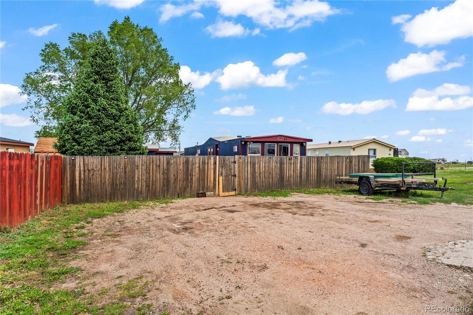 75 North Curtis Road Colorado Springs, CO 80930 - Photo 19 of 19 a view of a backyard with of trees