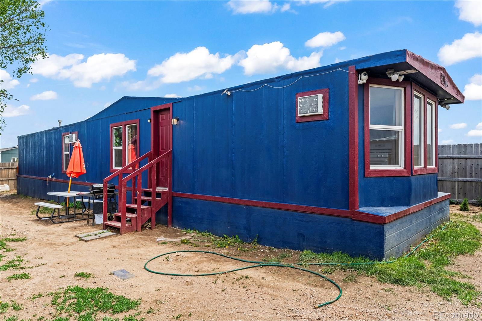 75 North Curtis Road Colorado Springs, CO 80930 - Photo 2 of 19 a view of house with a yard