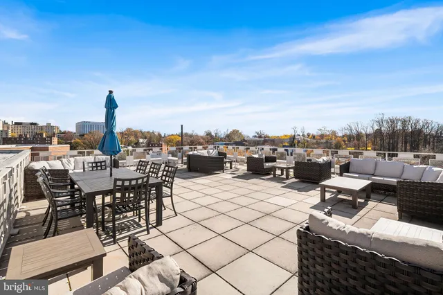 a view of parking space with parked cars