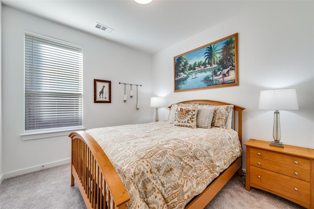 3513 Dusty Miller Road Aubrey, TX 76227 - Photo 16 of 25 a bedroom with a bed and a window