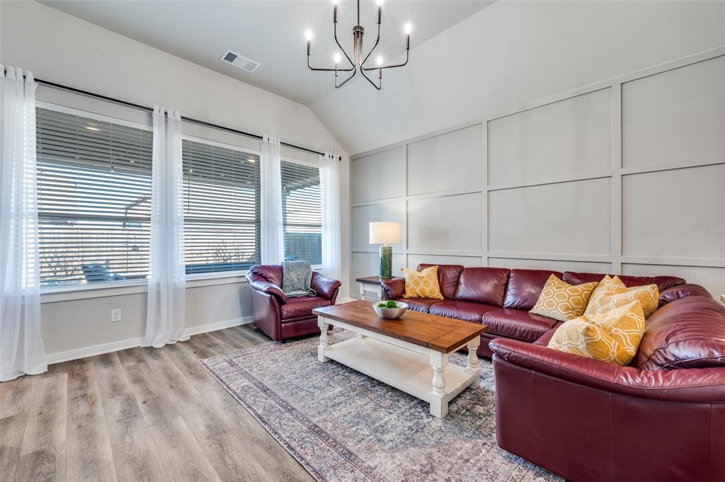 3513 Dusty Miller Road Aubrey, TX 76227 - Photo 5 of 25 a living room with furniture and a large window