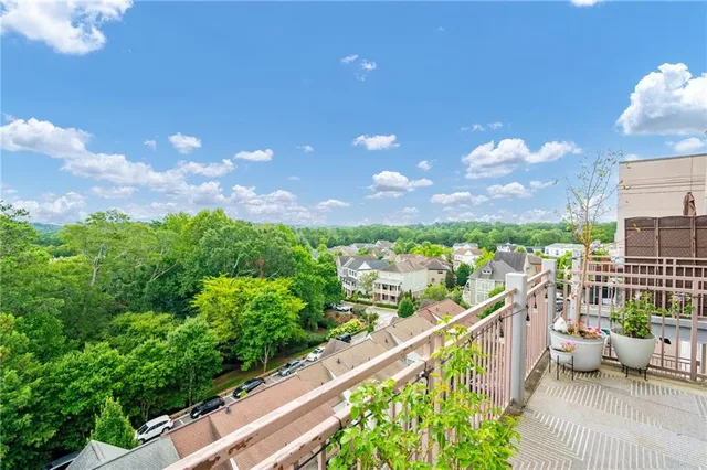 a view of a balcony with city view
