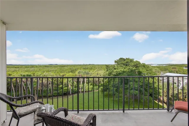 a view of a balcony with lake view