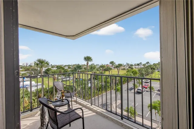 a view of a balcony with lake view and mountain view