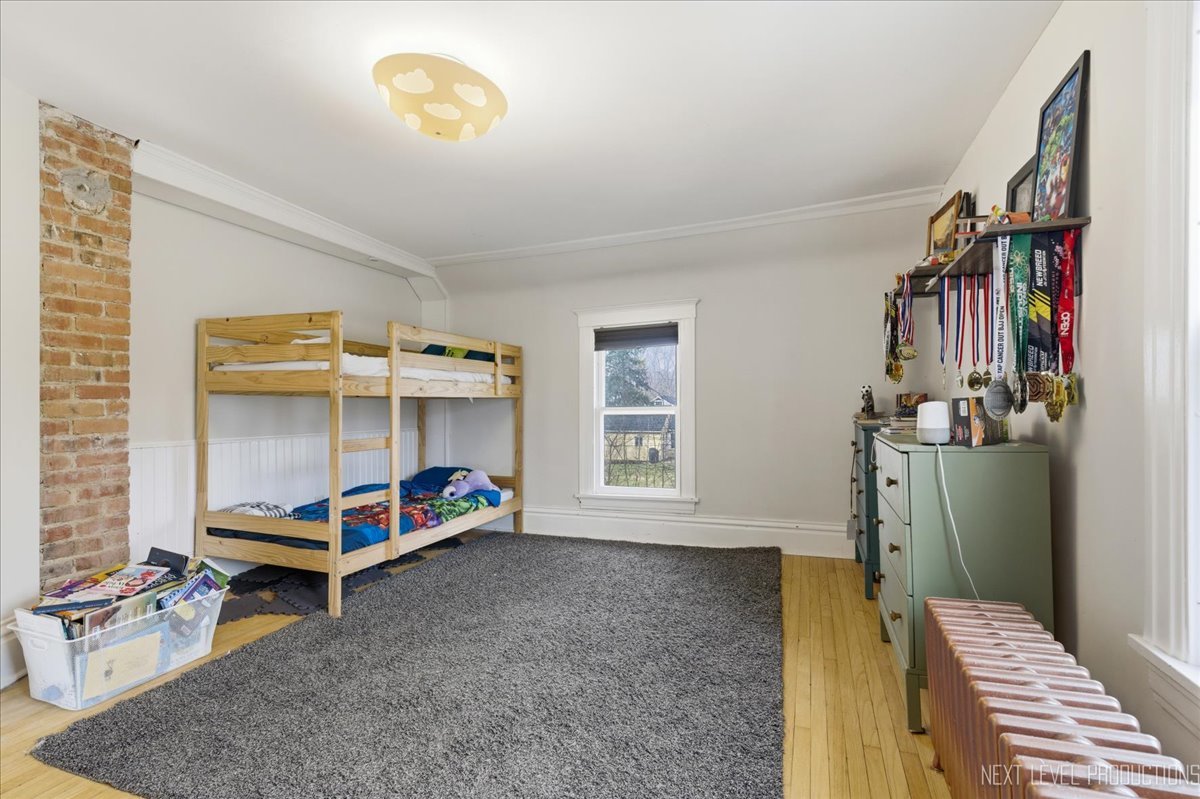 622 Spring Street Batavia, IL 60510 - Photo 26 of 26 a bedroom with furniture and a window