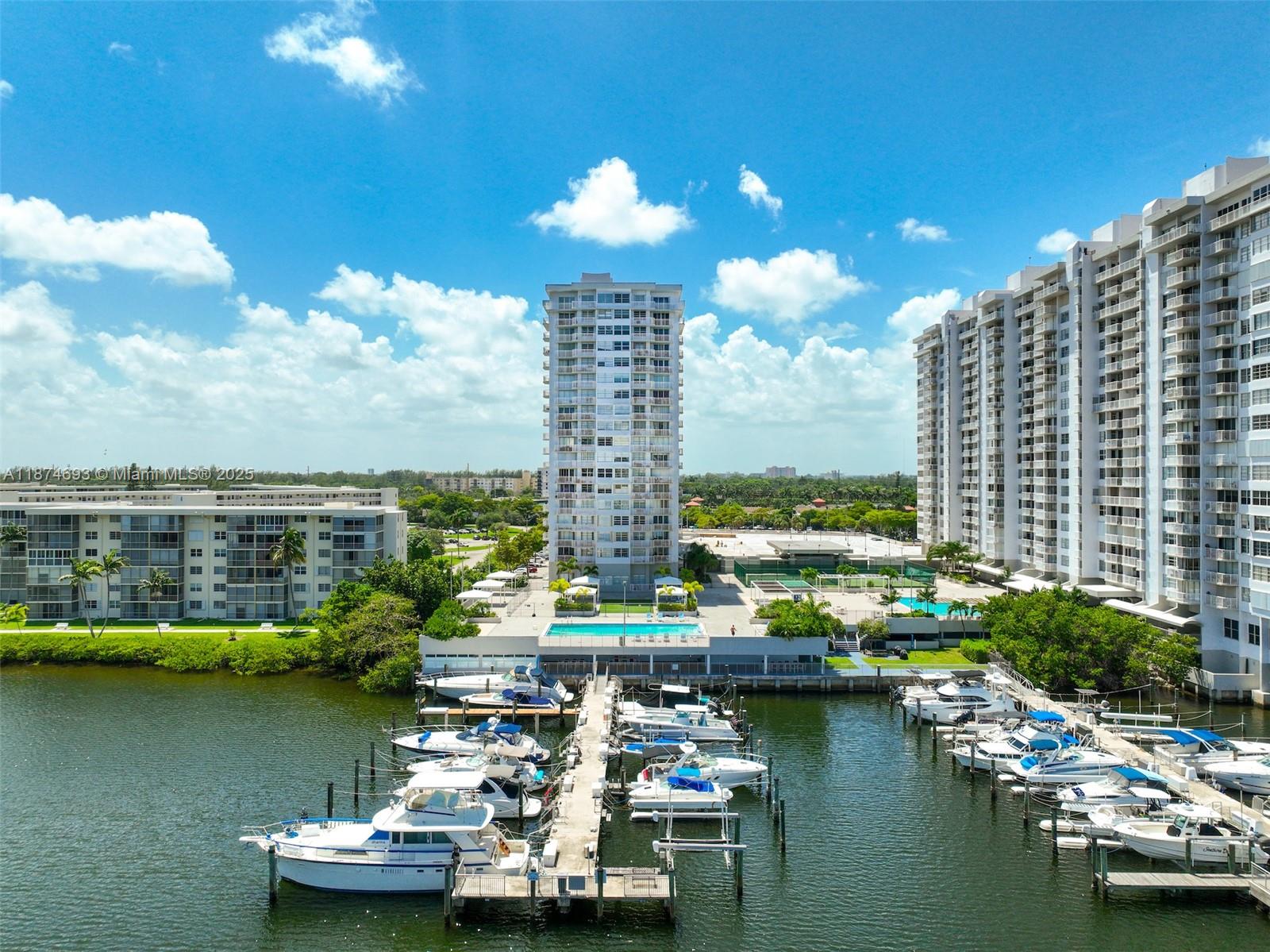 18041 Biscayne Boulevard, Unit 1404 Aventura, FL 33160 - Photo 21 of 22 a view of a lake with tall building