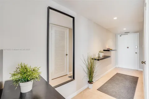 a view of balcony with furniture and city view