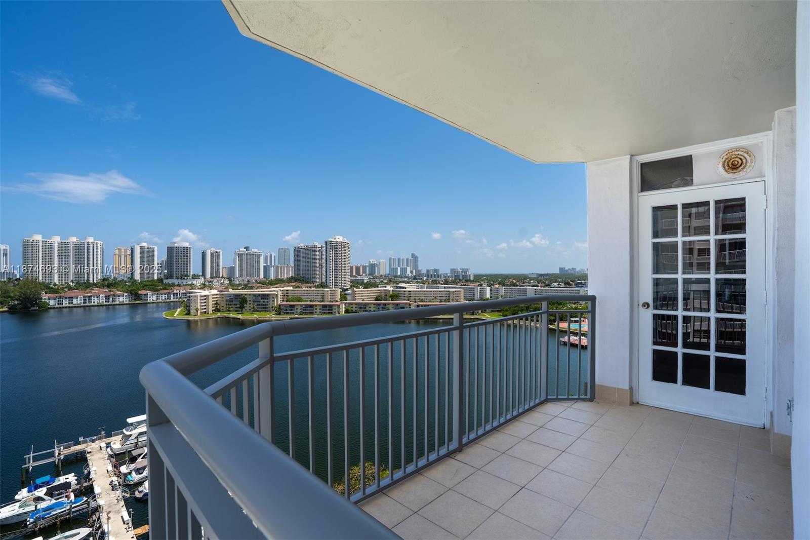 18041 Biscayne Boulevard, Unit 1404 Aventura, FL 33160 - Photo 4 of 22 a view of balcony with furniture and city view