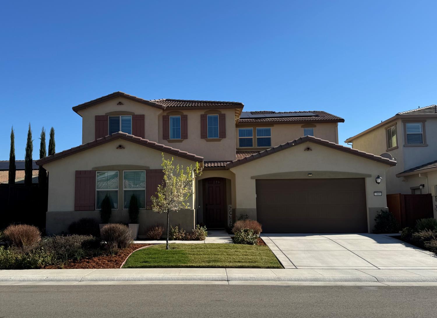 7009 Fox Trot Way Roseville, CA 95747 - Photo 1 of 42 7009 Fox Trot Way. Main entrance center, 3 car tandem garage, and in-law suite entrance to the left.