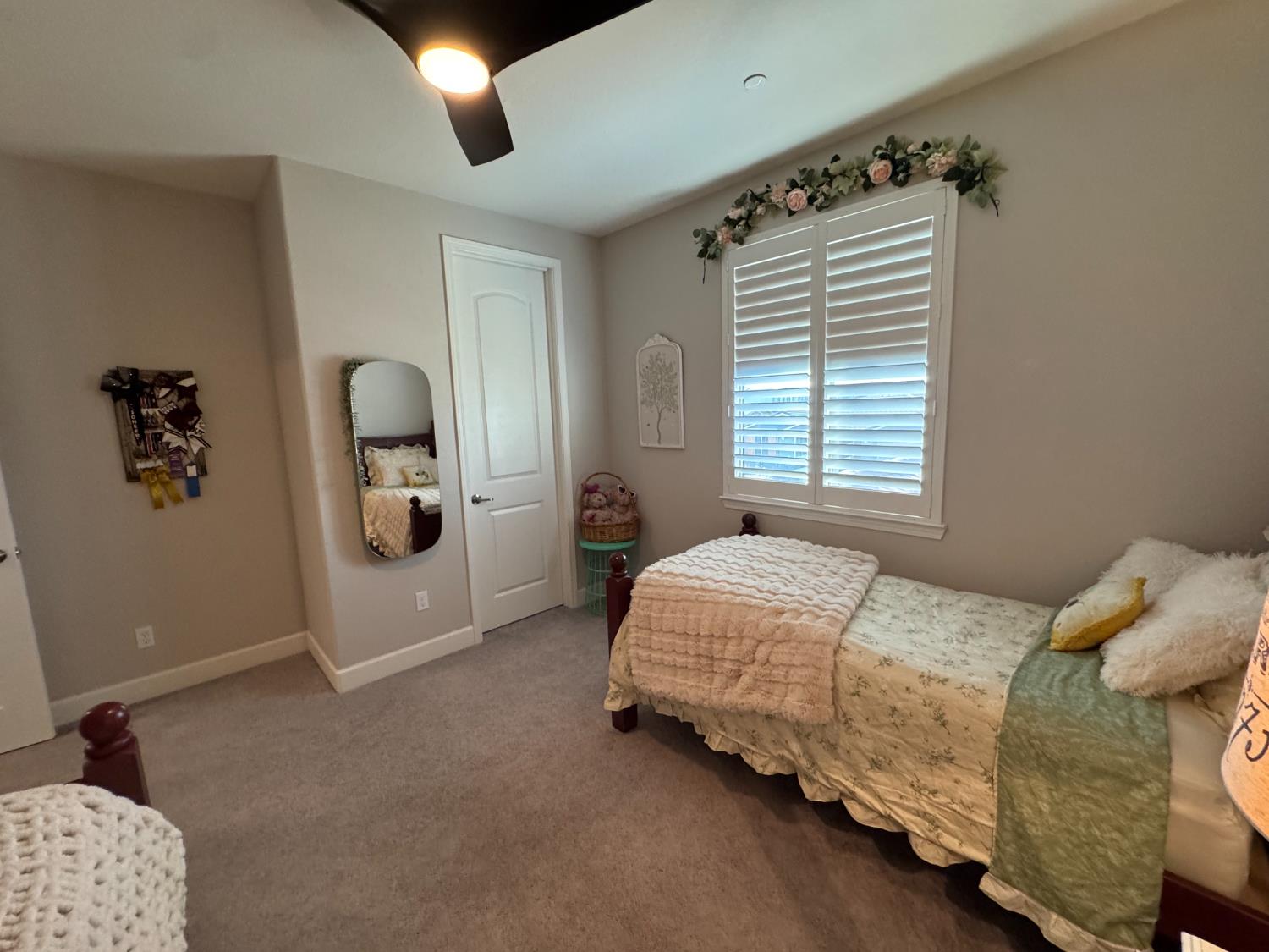 7009 Fox Trot Way Roseville, CA 95747 - Photo 28 of 42 2nd upstairs bedroom walk-in closet door