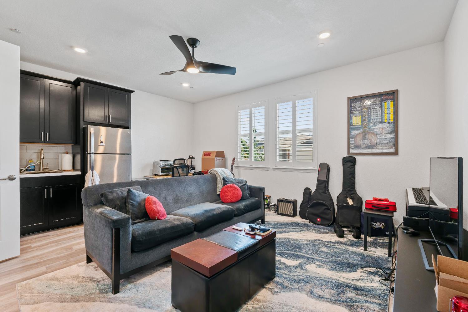 7009 Fox Trot Way Roseville, CA 95747 - Photo 34 of 42 In-law suite family room and kitchen