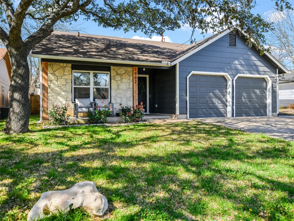 7902 Copano Drive Austin, TX 78749 - Photo 1 of 1 a front view of a house with a yard